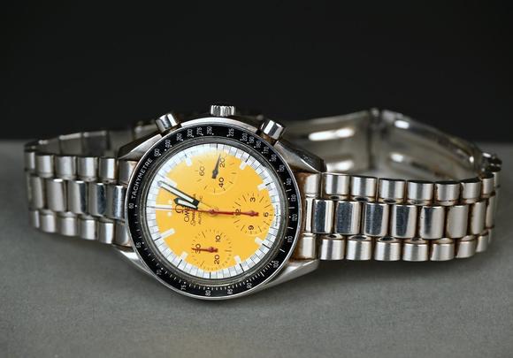 Loeckx AuctioneersOmega Speedmaster \'Schumacher\' with yellow dial, a…