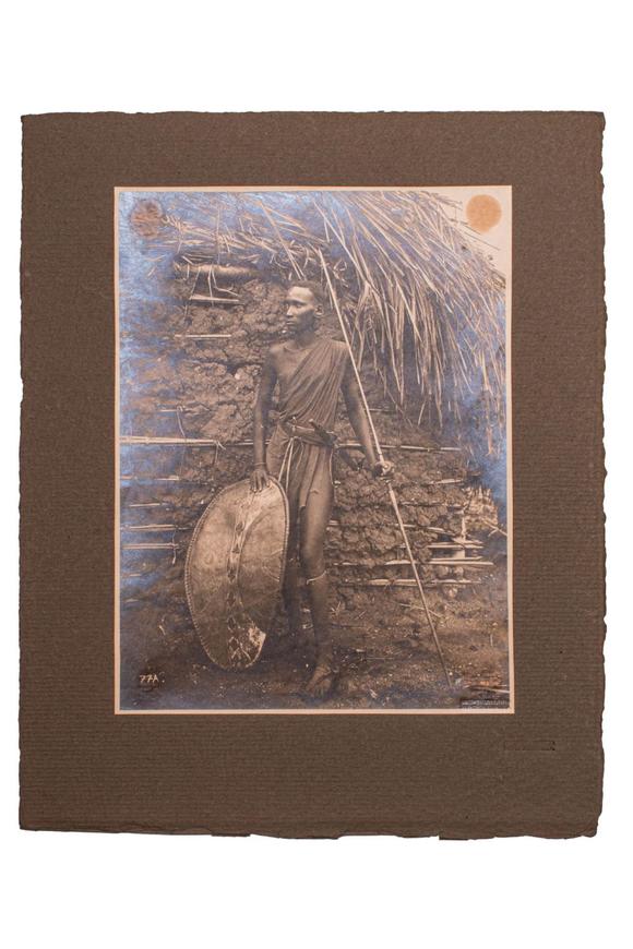 Apollo Art AuctionsCa. 20th century AD. 
A group of two photographs. The upper one depicts a group of people gathere