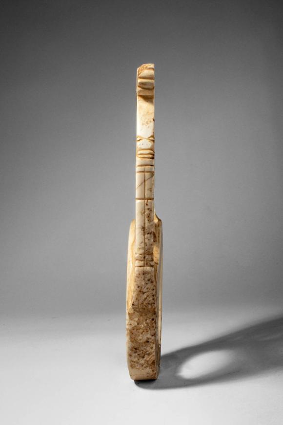 Apollo Art AuctionsCa. early 20th century AD. >
A pale stone openwork barava pendant features a complex figural comp