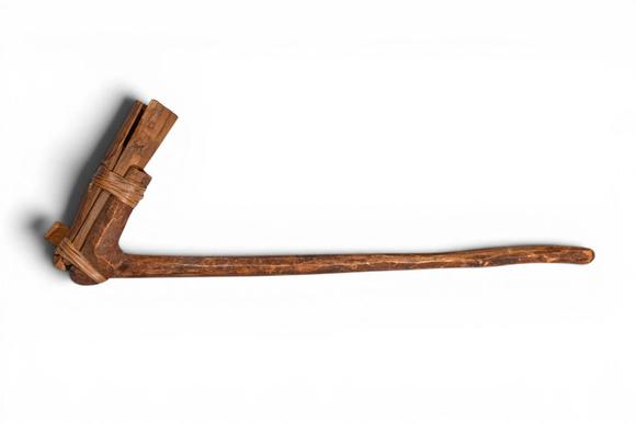 Apollo Art AuctionsCa. 20th century AD. >
A wooden adze pounder of characteristic L-shaped form, the long, slightly