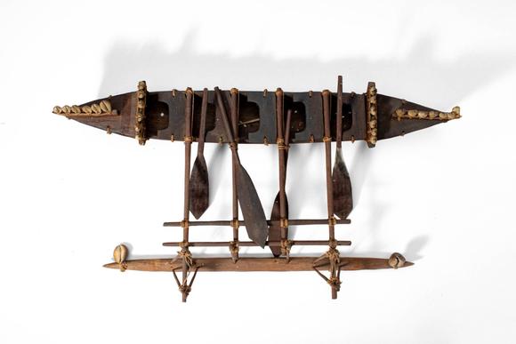 Apollo Art AuctionsCa. 20th century AD. >
A finely constructed model of a traditional Samoan outrigger canoe, carved