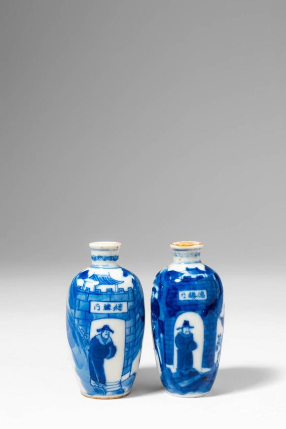 Apollo Art AuctionsQing Dynasty, Ca. AD 1644 - 1912. >
An engaging pair of porcelain snuff bottles of ovoid form wit