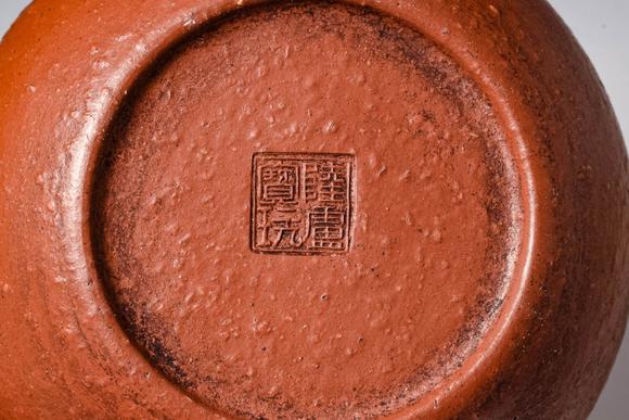 Apollo Art AuctionsQing Dynasty, Ca. AD 1644 - 1912. >A Yixing stoneware teapot of compact, globular form, the round