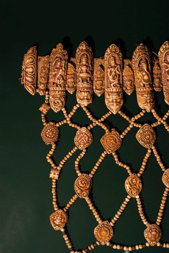 Apollo Art AuctionsCa. 16th - 17th century AD. >
An elaborate ritual bone apron composed of intricately carved plaqu