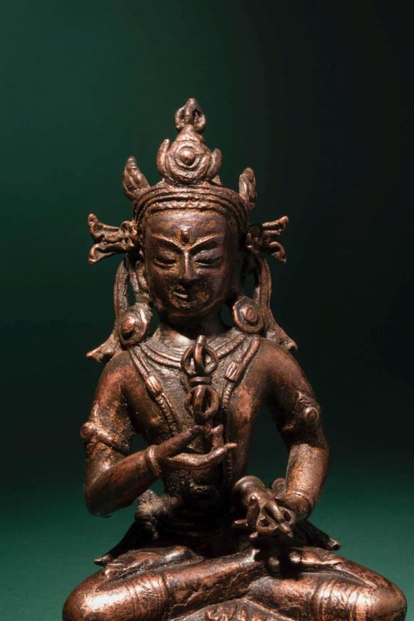 Apollo Art AuctionsCa. 14th century AD. >
A beautiful cast gilt copper alloy figure of Vajrasattva, seated in vajrap