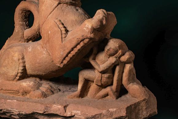 Apollo Art AuctionsCa. 11th - 12th century AD. >
A carved sandstone sculpture depicting a recumbent lion, shown with