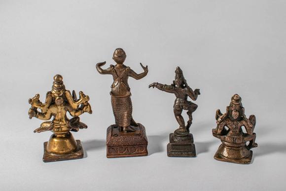 Apollo Art AuctionsCa. 14th-19th century AD. A group of four cast bronze figures depicting various Hindu deities, in