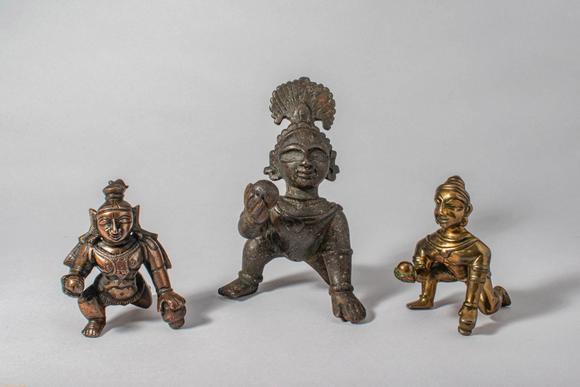 Apollo Art AuctionsCa. 12th-19th century AD. A group of three bronze figures of Krishna as the Butter Thief, each de
