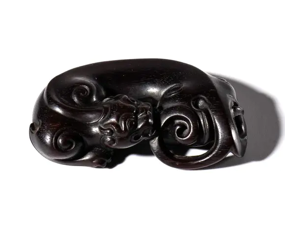 Bertolami Fine ArtA dragon figurine carved from sandalwood. China, 20th century.