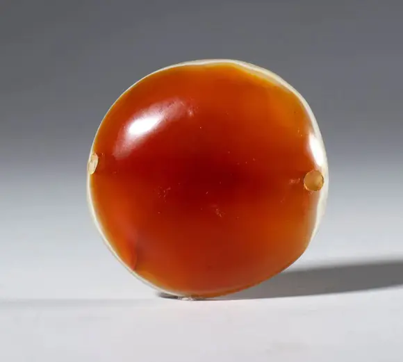 Bertolami Fine ArtA Lukmik bead in orange-white zoned agate. Tibet, 19th century