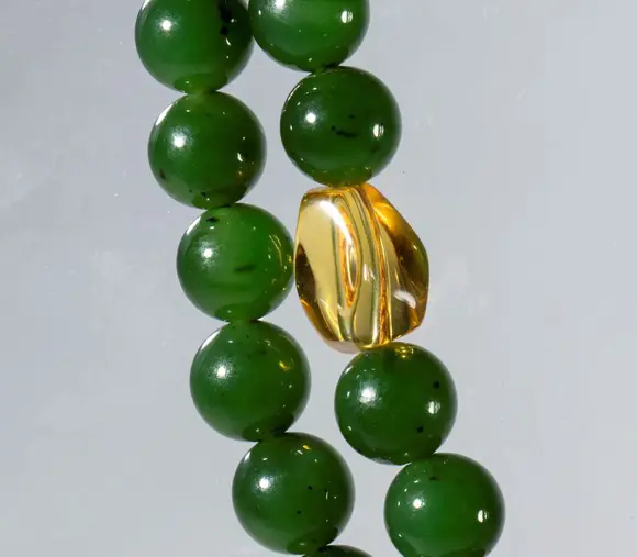 Bertolami Fine ArtMala composed of 108 green jade, carnelian, amethyst, smoky quartz, and citrine beads. China, Qing Dynasty (1644-1912), 19th century.