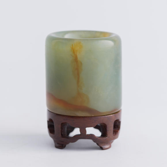 Oakridge Auction Gallery清代 翡翠扳指及碧玉扳指（附木座）  A Chinese jadeite and a spinach jade archer's ring