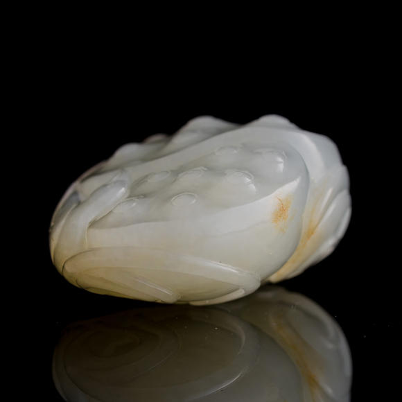 Oakridge Auction Gallery十八/十九世紀(jì) 白玉雕蓮蓬把件  A Chinese carved white jade carving of a lotus pod