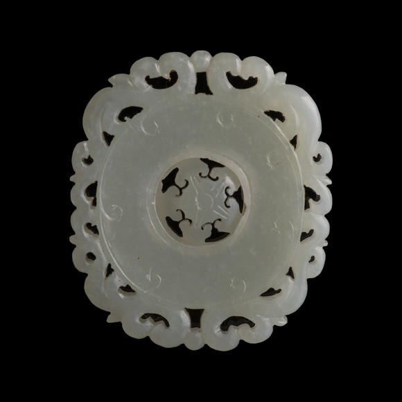 Oakridge Auction Gallery十八世紀 白玉轉心佩（附木座）  A Chinese carved white jade rotating-center pendant