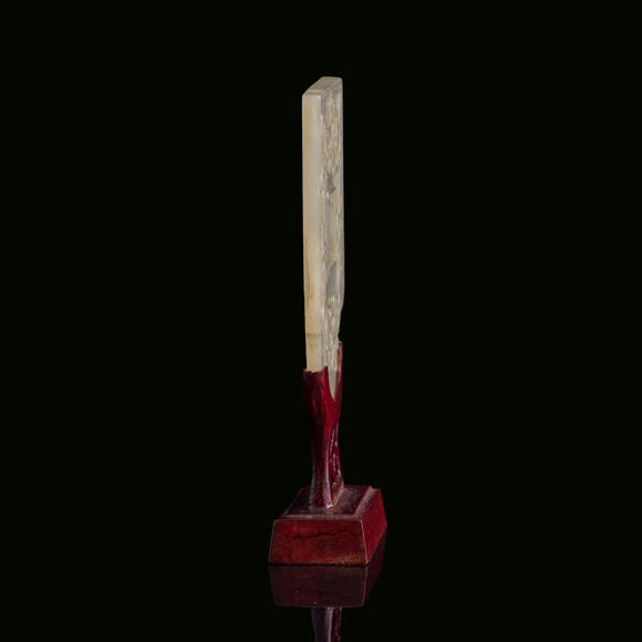 Oakridge Auction Gallery十九世紀 白玉雕螭龍紋斧形佩（附木架）  A Chinese carved white jade 'chilong' axe-form plaque