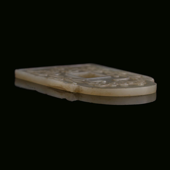 Oakridge Auction Gallery十九世紀 白玉雕螭龍紋斧形佩（附木架）  A Chinese carved white jade 'chilong' axe-form plaque