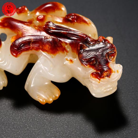 北京啟石明 紅皮白玉羽獸