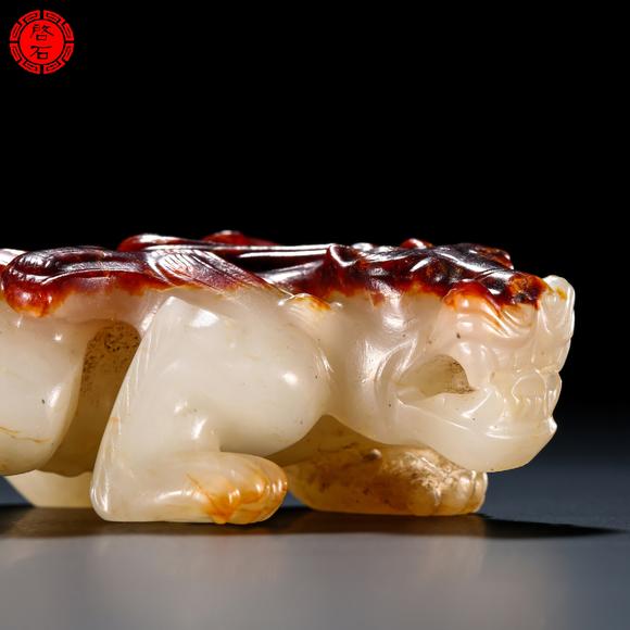 北京啟石明 紅皮白玉羽獸