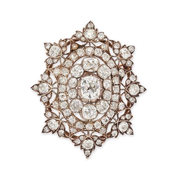 RoseberysA late Victorian diamond pendant/brooch, of openwork form, set with old-cut diamonds of varying size, mounted in silver, backed with gold, to a radiat