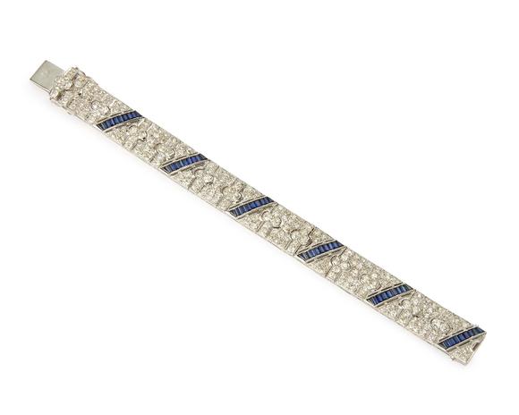 RoseberysA diamond and sapphire broad flexible bracelet, by Diafini, composed of old-brilliant-cut diamond articulated panels forming parallelogram sections ea