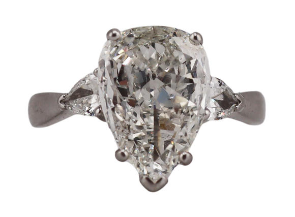 Clarke Auction GalleryJEWELRY. Platinum and 3.59ct Pear Diamond Ring.