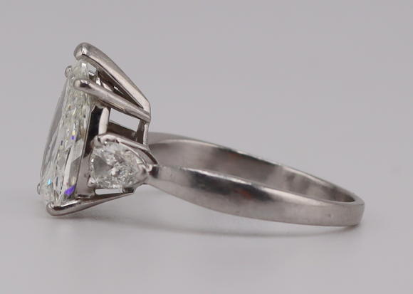 Clarke Auction GalleryJEWELRY. Platinum and 3.59ct Pear Diamond Ring.