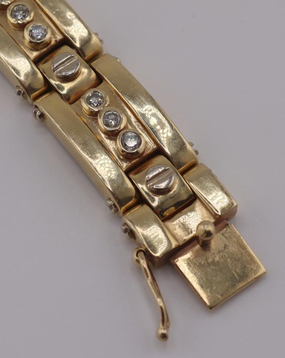 Clarke Auction GalleryJEWELRY. Men's 14kt Gold and Diamond Bracelet.
