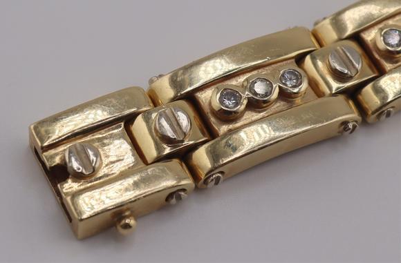 Clarke Auction GalleryJEWELRY. Men's 14kt Gold and Diamond Bracelet.