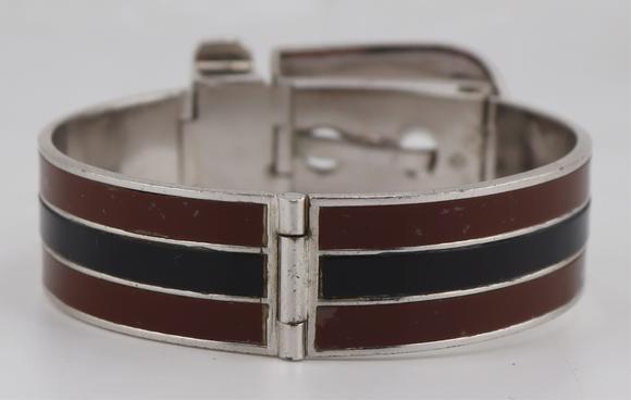 Clarke Auction GalleryJEWELRY. Gucci Brown and Black Enamel Bracelet.