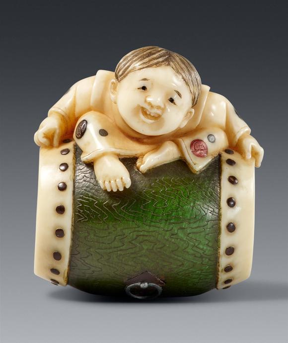 Kunsthaus Lempertz KGA partly stained netsuke of a boy by Kodama Yoshiaki. Late 19th century