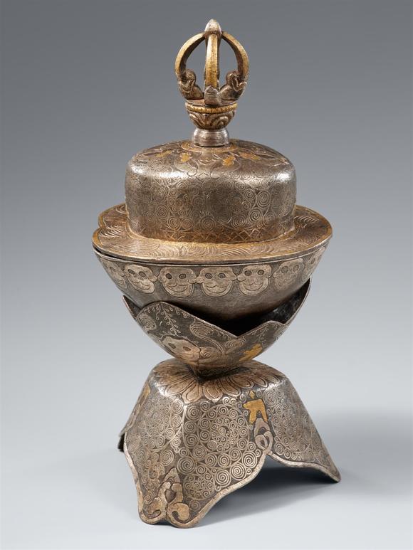 Kunsthaus Lempertz KGAn Eastern Tibetan gold and silver damascened iron altar kapala. 16th century