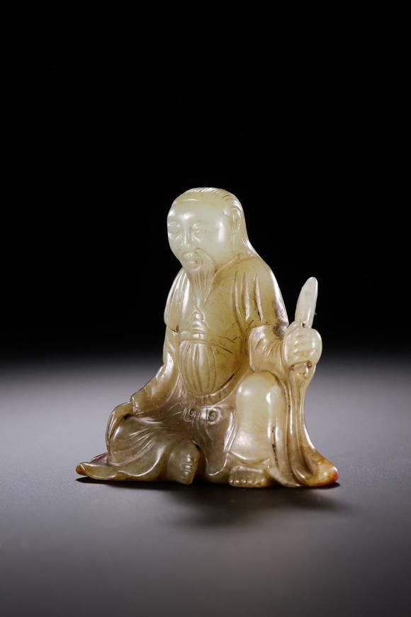 HUNG YUN ZHAI AUCTION HOUSE INCHetian Jade Seated Scholar Figure
