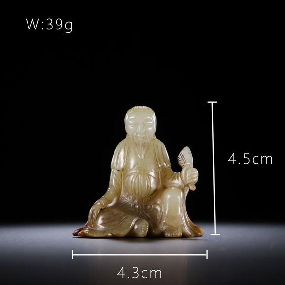 HUNG YUN ZHAI AUCTION HOUSE INCHetian Jade Seated Scholar Figure
