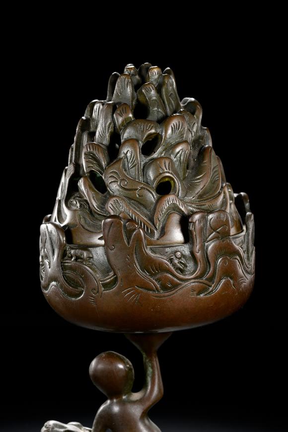 HUNG YUN ZHAI AUCTION HOUSE INCBronze Boshan Incense Burner with Central Asian (Hu) Figure Riding a Beast