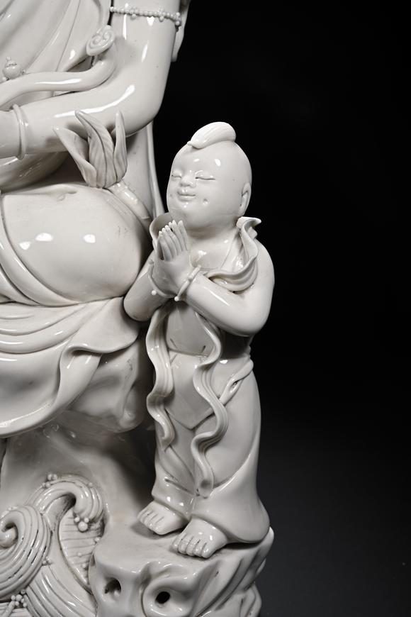 HUNG YUN ZHAI AUCTION HOUSE INCDehua White-Glazed Songzi Guanyin (Bestowing Children)