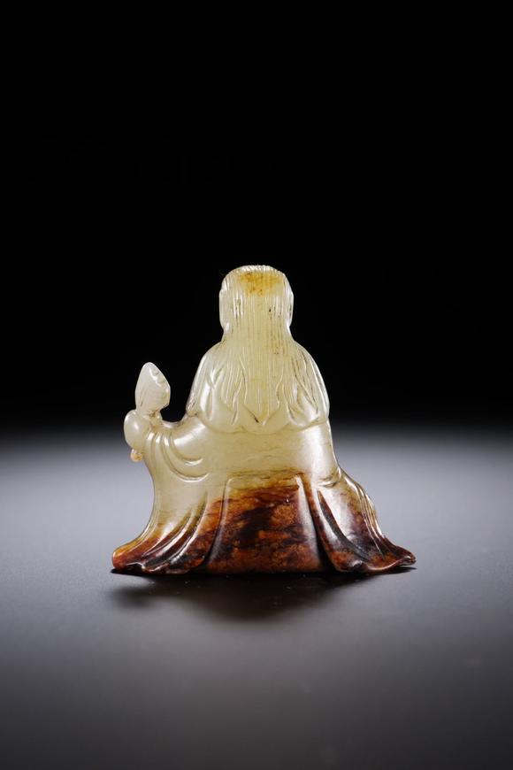 HUNG YUN ZHAI AUCTION HOUSE INCHetian Jade Seated Scholar Figure