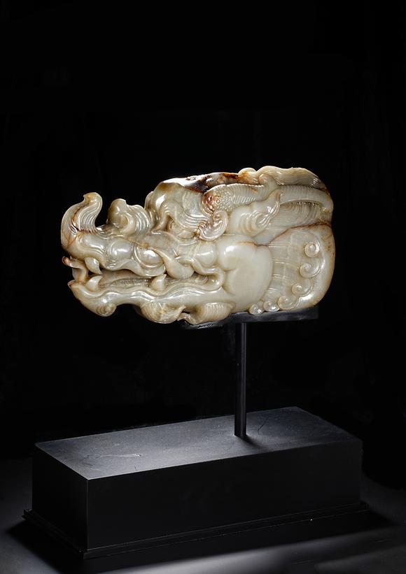 HUNG YUN ZHAI AUCTION HOUSE INCPre-Ming Dynasty or Earlier Hetian Jade Dragon-Head Ornament