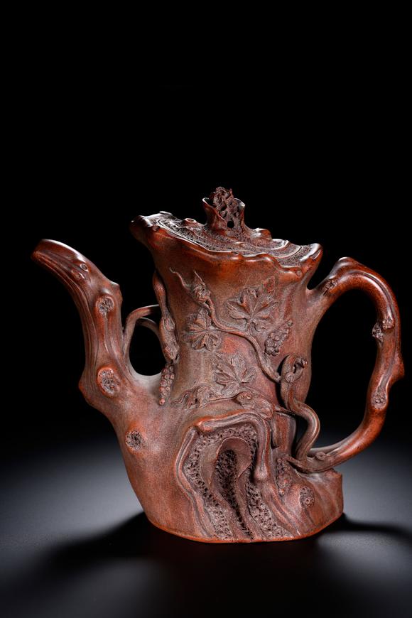 HUNG YUN ZHAI AUCTION HOUSE INCZhu Kexin-marked Squirrel and Grape Tree Stump Yixing Zisha Teapot