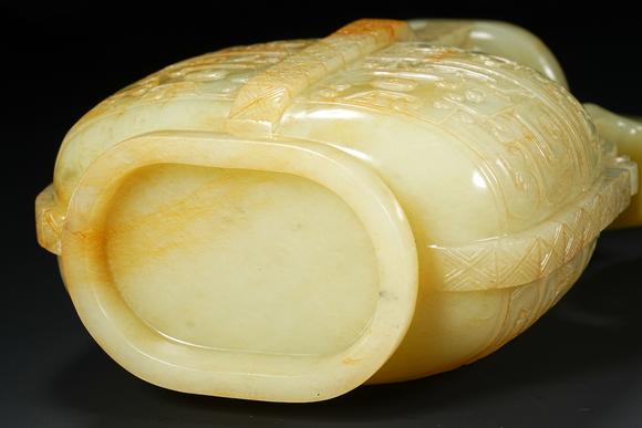 日本東競株式會(huì)社黃玉饕餮紋提梁壺