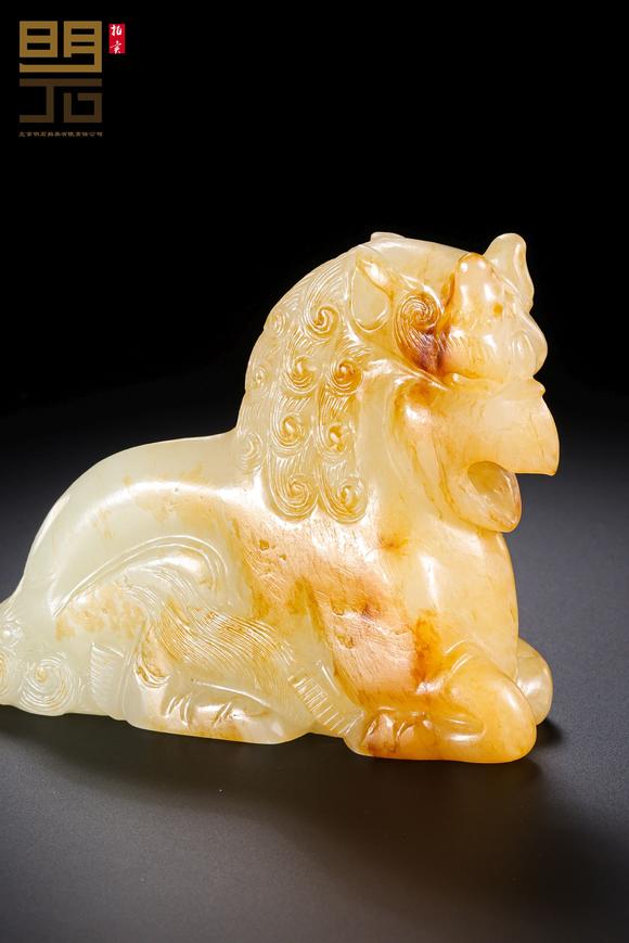 北京明石拍賣有限公司明 白玉紅沁獅鷲神獸