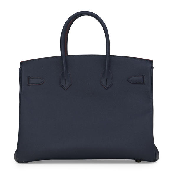 Piguet - H?tel des VentesHermès, sac Birkin 35 Contour en cuir Epsom bleu Indigo et finition rouge, 2016 éd. limitée, tirette et clochette avec 2 clefs et cadena