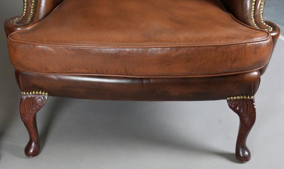 TooveysA pair of late 20th century George III style wing back armchairs, up