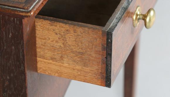 TooveysA George III provincial oak side table, probably North Country, the