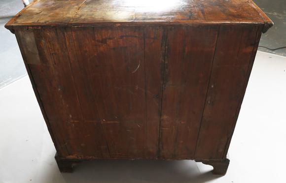 TooveysA George I walnut chest of oak-lined drawers with feather banded bor