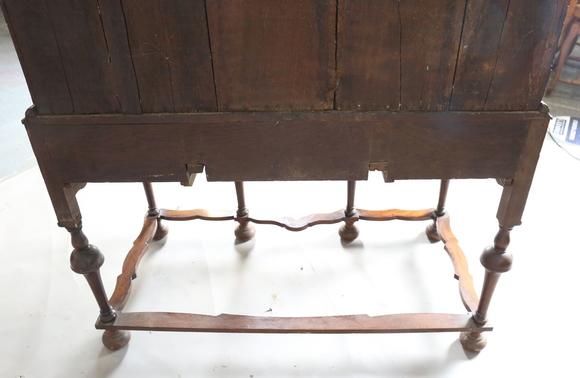 TooveysA George I and later burr walnut chest-on-stand with overall feather