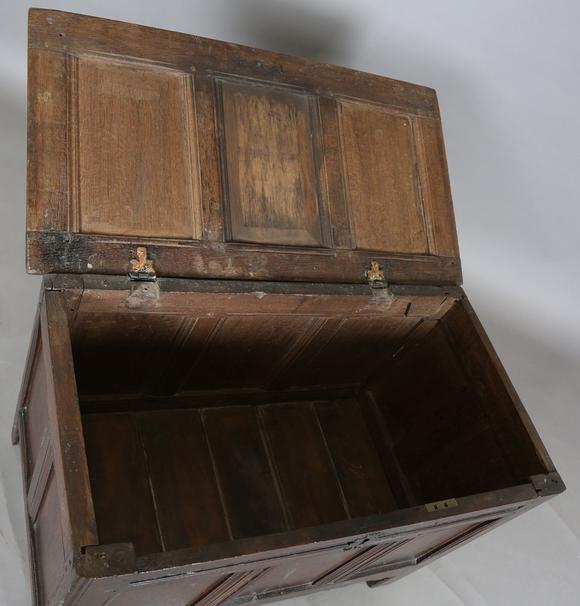 TooveysAn early 18th century provincial oak panelled coffer with incised de