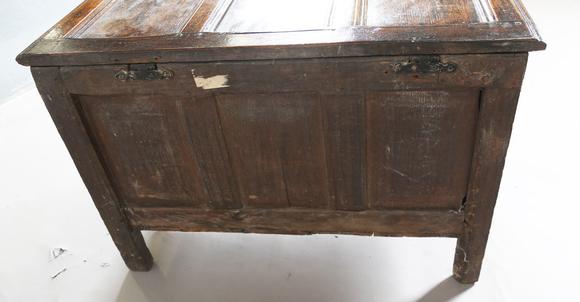 TooveysAn early 18th century provincial oak panelled coffer with incised de