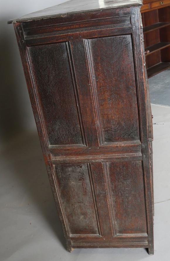 TooveysA 17th century oak side cupboard, fitted with four panelled doors, h