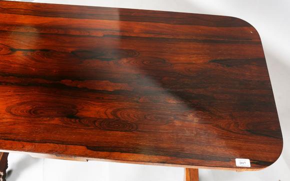 TooveysAn early Victorian rosewood centre table, fitted with two frieze dra