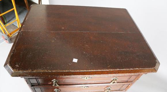 TooveysA late Victorian Aesthetic Movement stained oak chest of six drawers